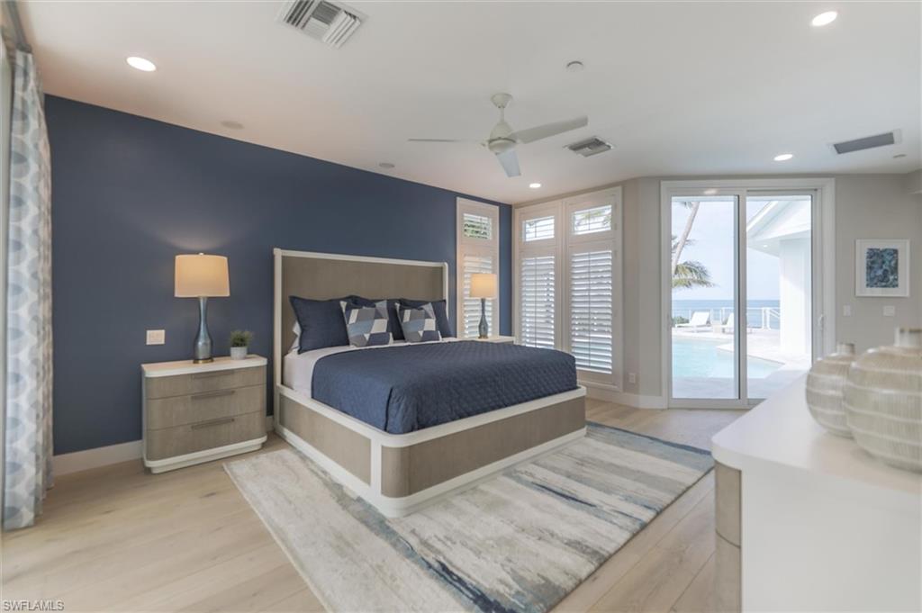 Bedroom with ceiling fan, light hardwood / wood-style flooring, and access to outside