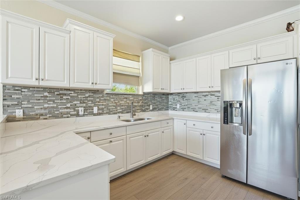 Utilize buyer credit for new flooring and paint. Virtually remodeled.