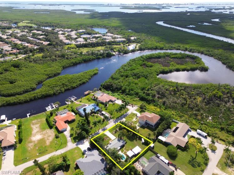 River of Estero/Gulf access walking distance to the community boat ramp.