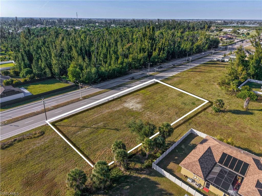 Aerial view of property's location featuring property parcel outlined