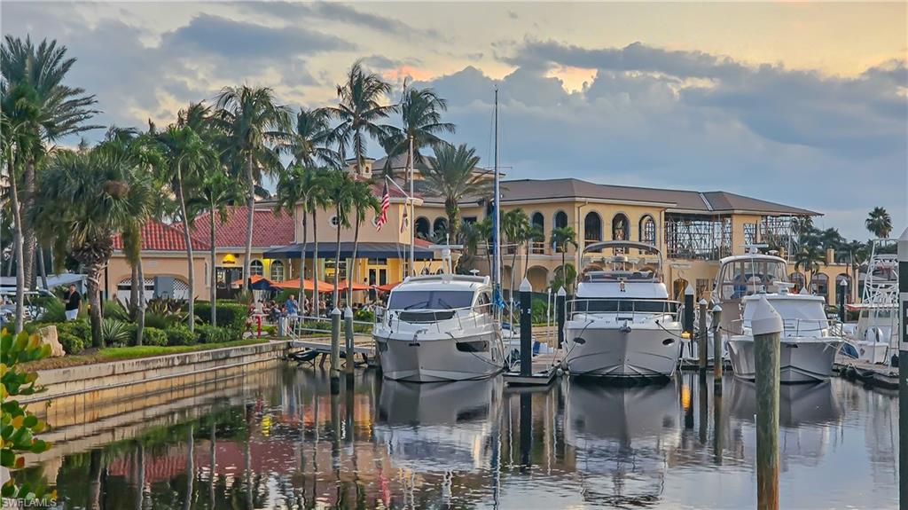 Dock area featuring a water view and boat lift