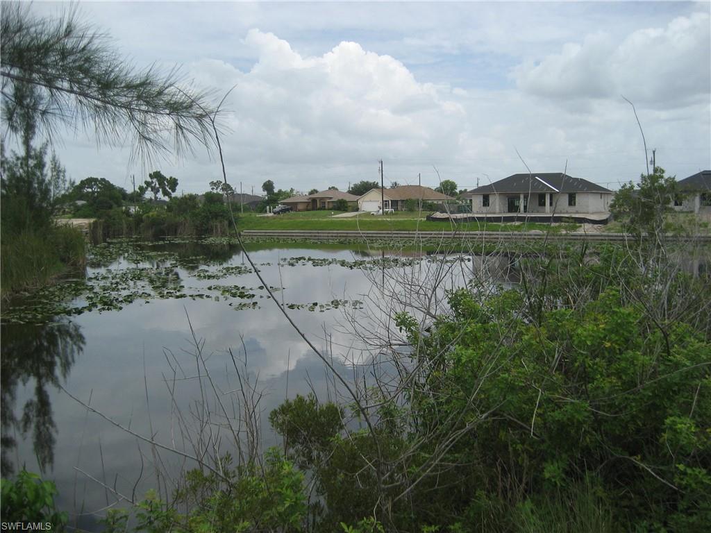Water view featuring nearby suburban area