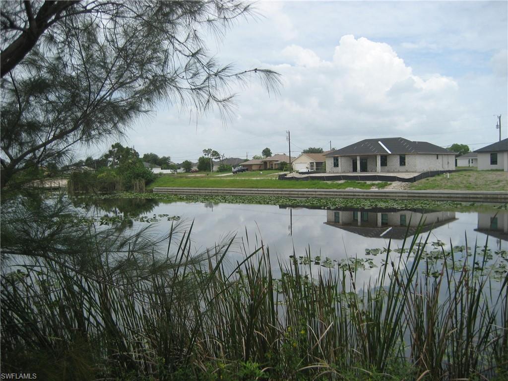 Water view with nearby suburban area