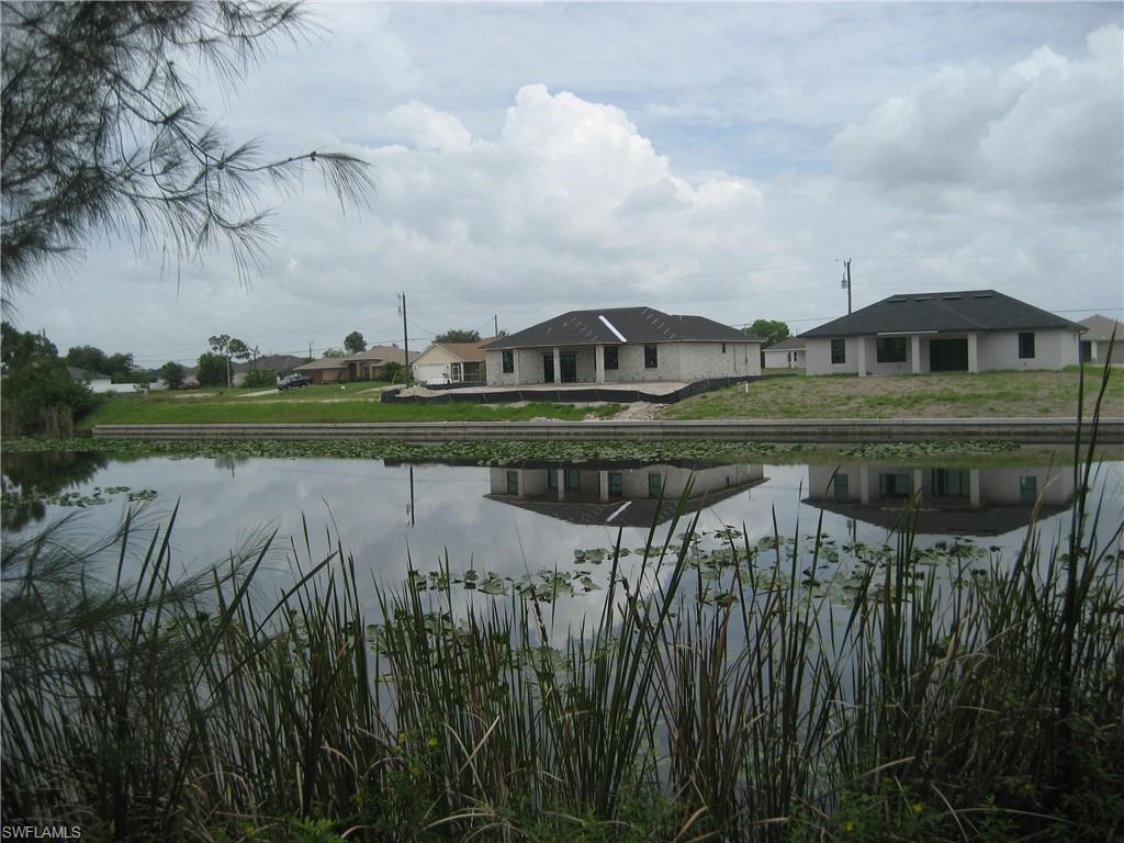 Water view featuring nearby suburban area