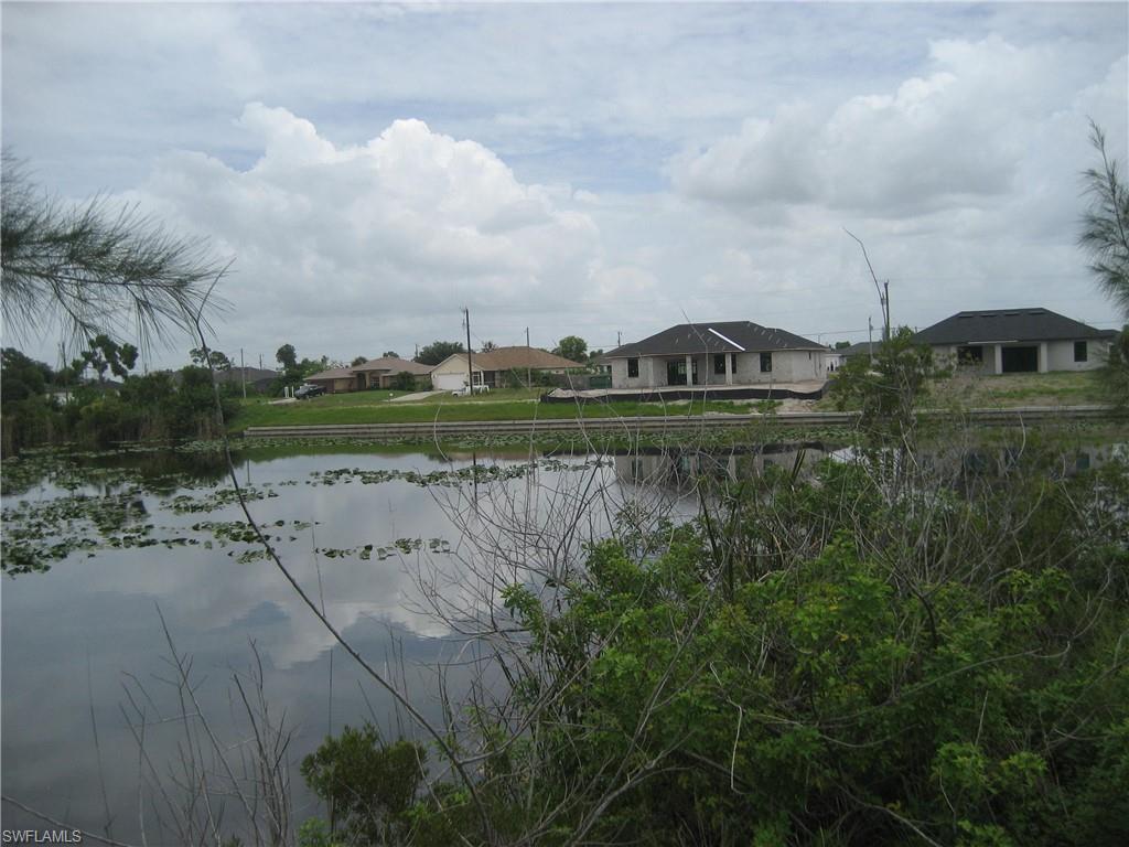 Water view featuring nearby suburban area