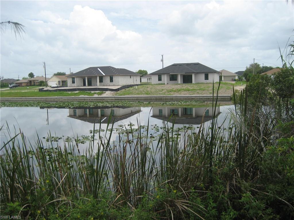 Water view featuring nearby suburban area