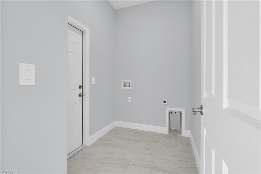 Laundry room with washer hookup and electric dryer hookup