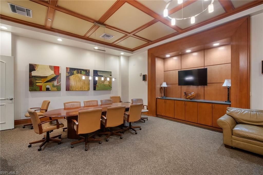 Office space featuring coffered ceiling and recessed lighting