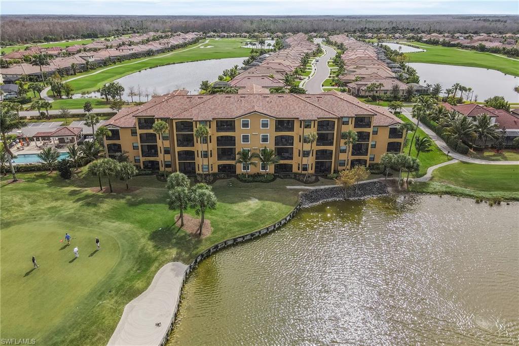 Beautiful lanai view of  first green and calming water.