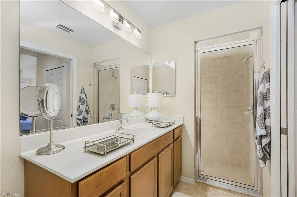 Master bath en-suite with large stall shower.