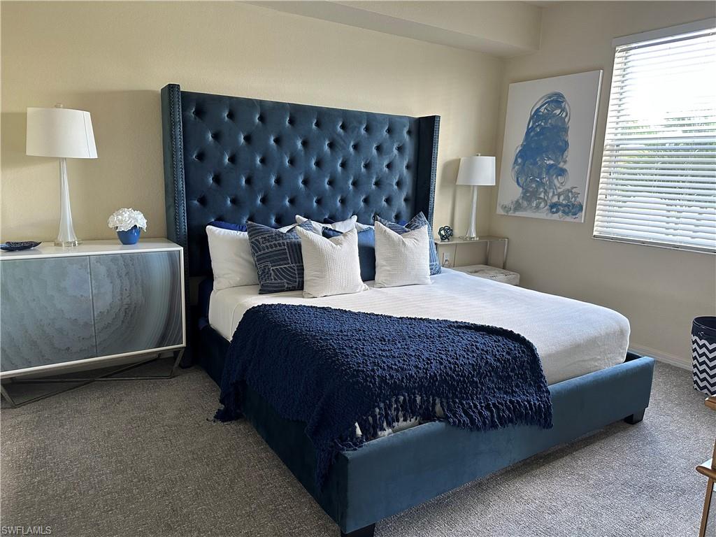 Master bedrm with King size bed.