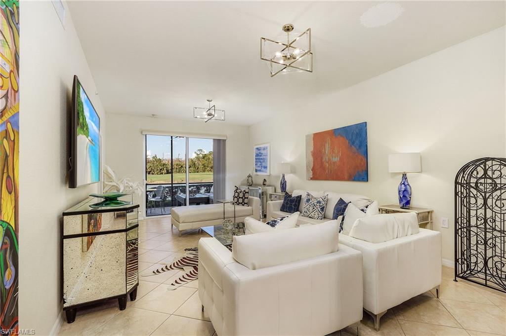 Living room with views of golf course.