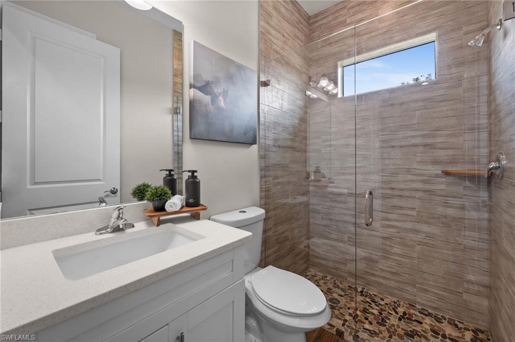 bathroom #2 with custom river rock shower