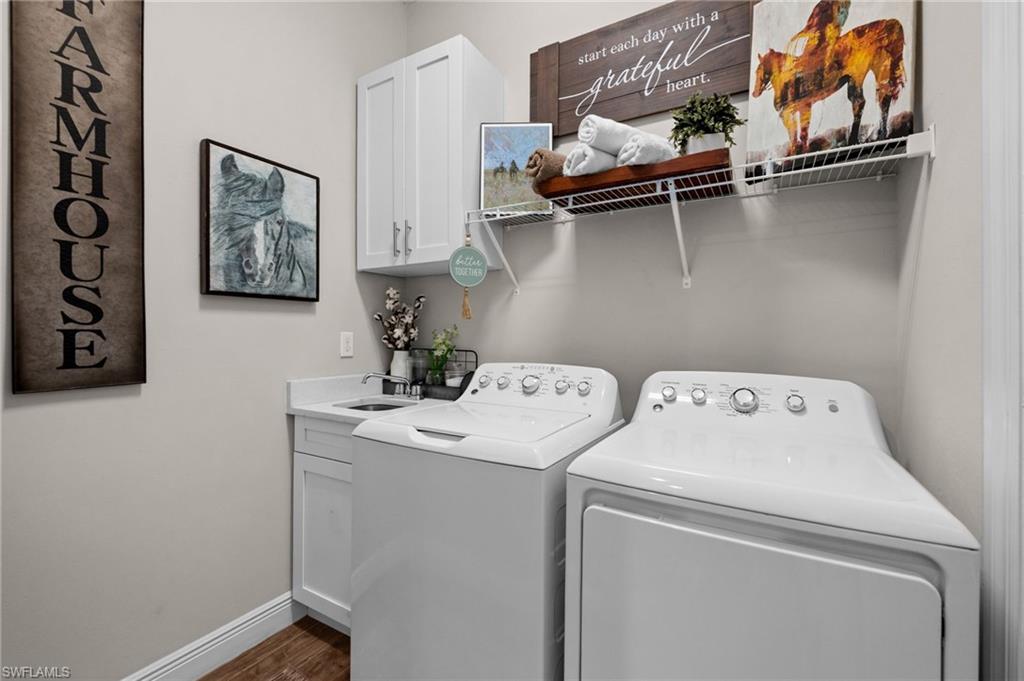 laundry room with utility sink