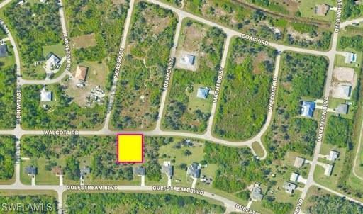 Aerial map of property and surrounding area with property parcel outlined