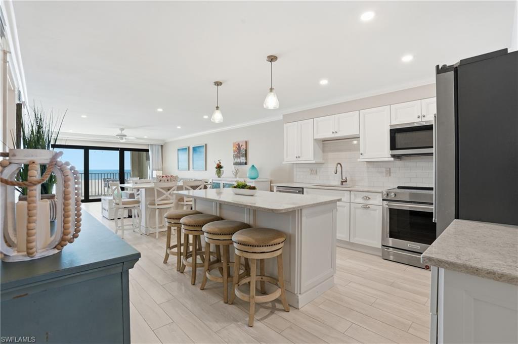 Kitchen featuring open floor plan - virtually enhanced
