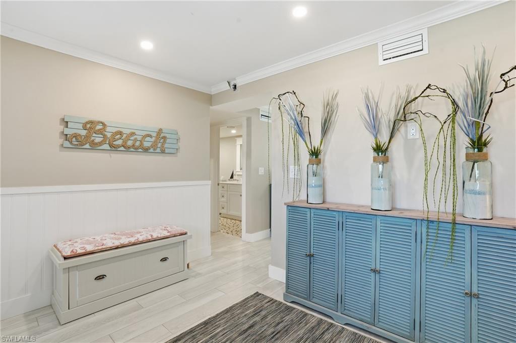 Den area with coastal decor - virtually enhanced