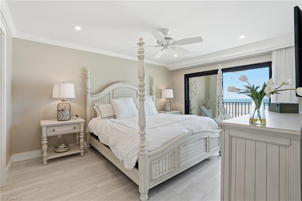 Primary bedroom with Gulf views -virtually enhanced