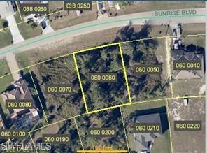 Aerial map of property and surrounding area featuring property boundaries highlighted