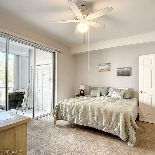 Bedroom with access to exterior, carpet, and ceiling fan
