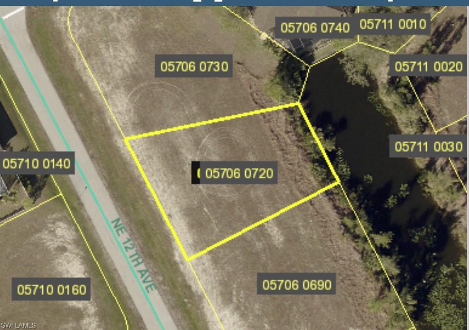 Aerial overview of property's location featuring property parcel outlined