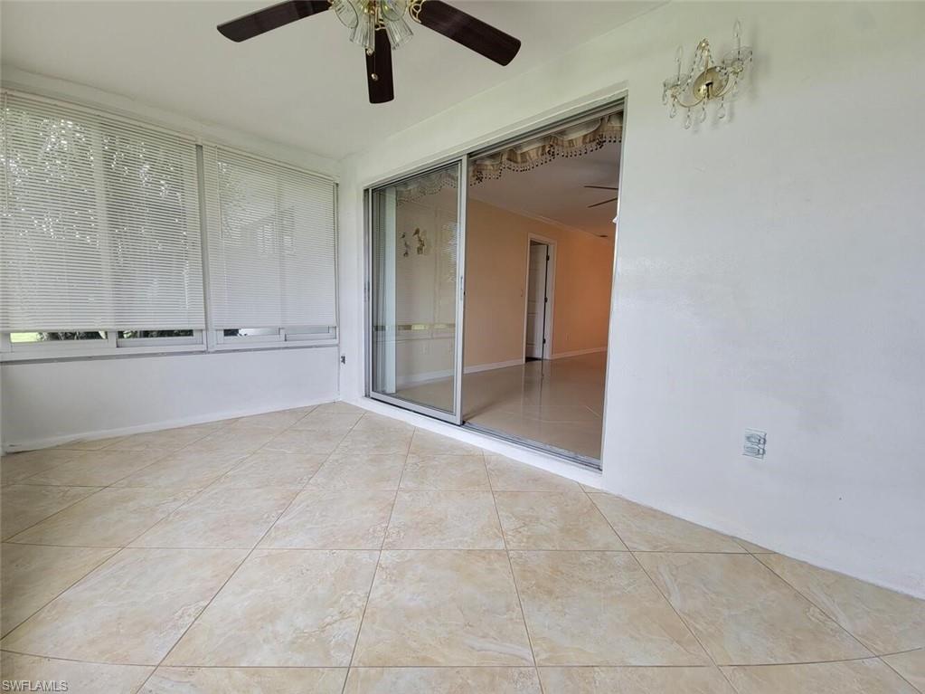 Spare room with light tile patterned floors