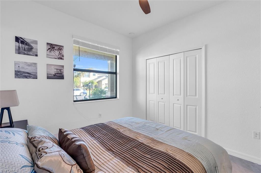 Bedroom with a closet and ceiling fan
