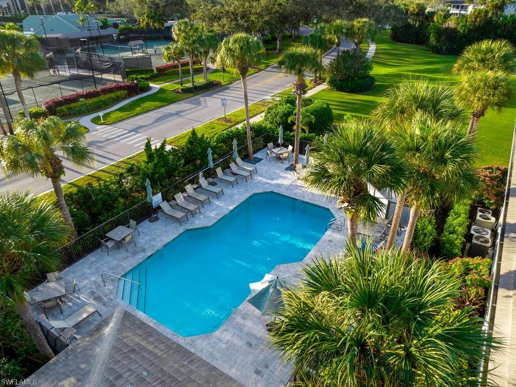 Community pool with a patio area