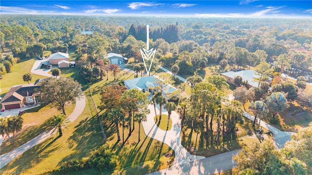 Aerial overview of property's location with a forest