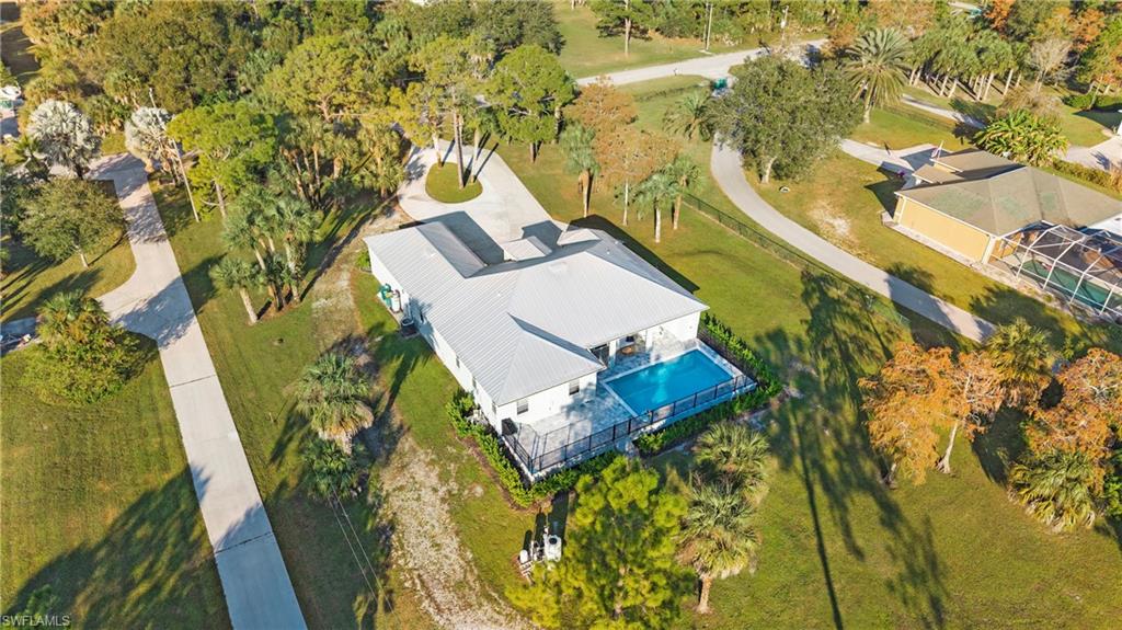 View from above of property featuring a pool area