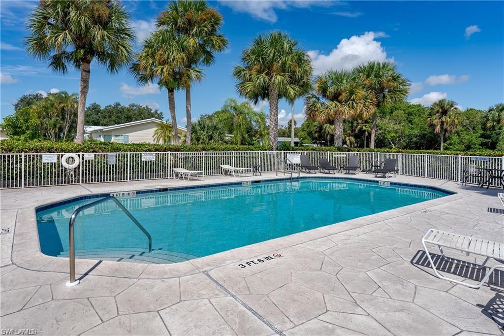 Community pool featuring a patio area
