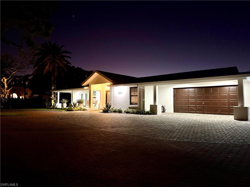 View of front of house with a garage
