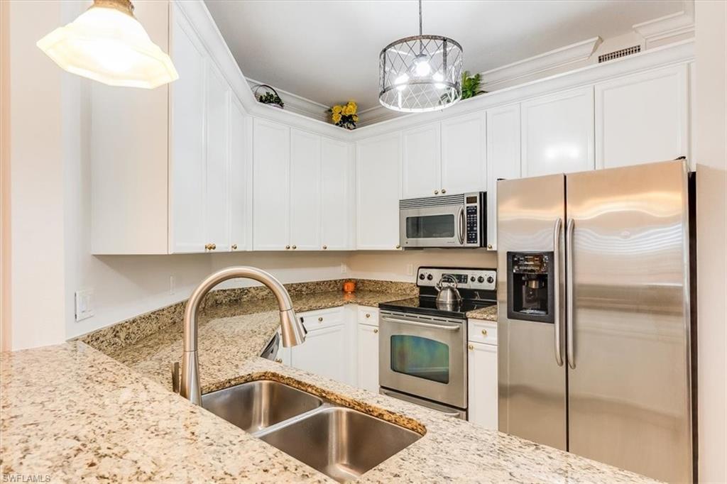 Granite, wrap around counter space galore!