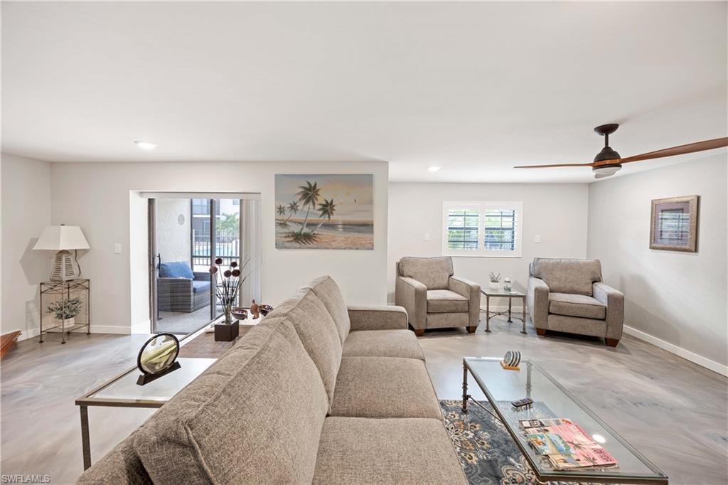 Living room featuring ceiling fan