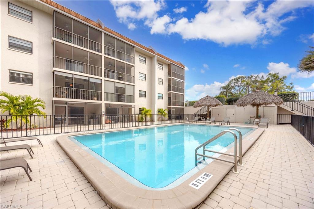 View of swimming pool with a patio area