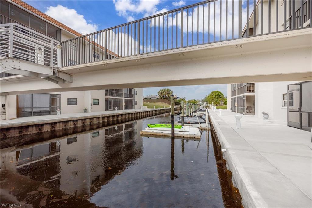View of swimming pool with a water view