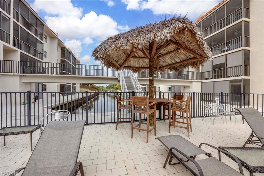View of patio / terrace featuring a water view