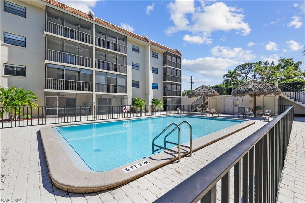 Community pool featuring a patio area