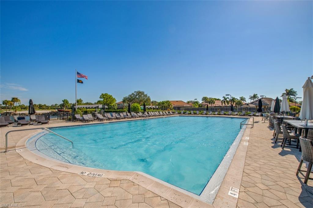 Community pool with a patio area