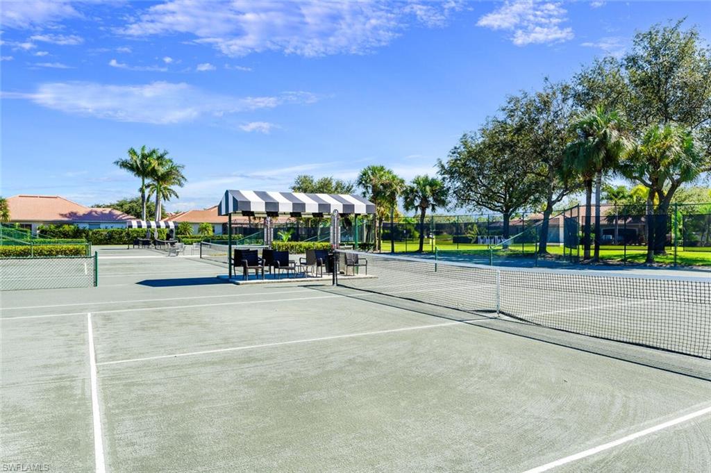 View of tennis court with fence