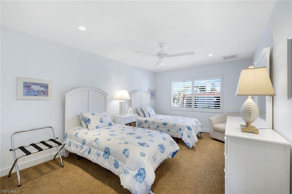 Bedroom featuring carpet, a ceiling fan, and recessed lighting