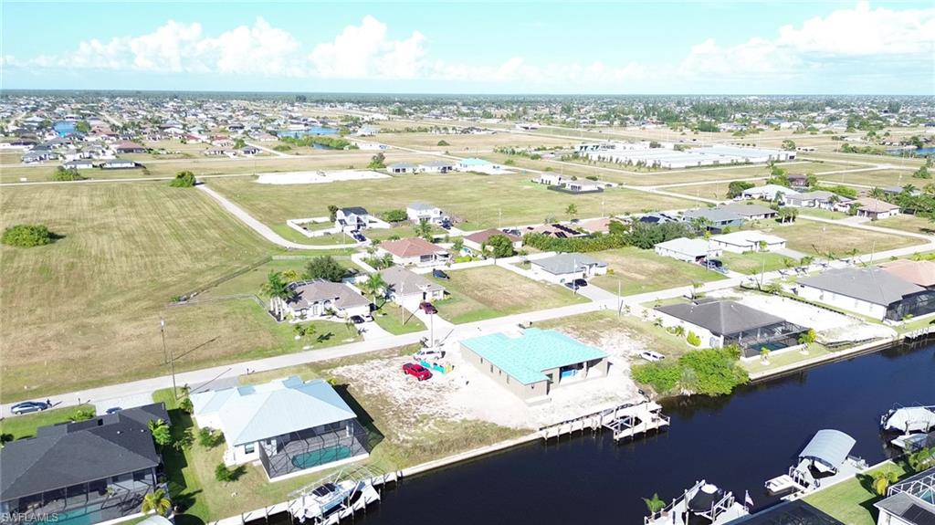Aerial view of residential area with a large body of water