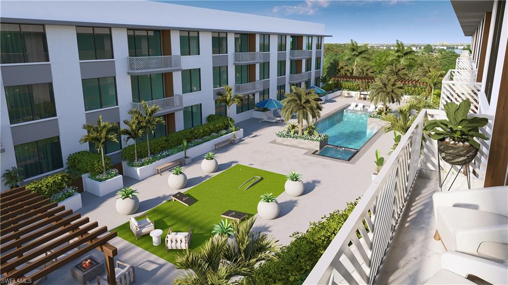 Drone / aerial view of a pool area and apartment complex. Virtual Rendering