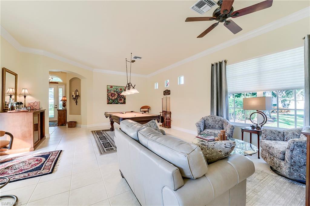 Seating area in game room.  Some homes use this area as the formal dining room