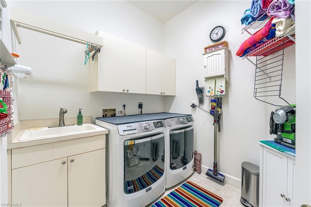 Large laundry room with newer w/d