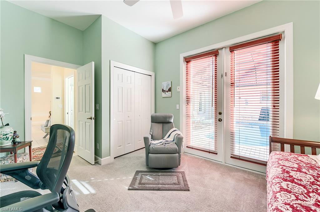 Bedroom 3 with French doors to the pool