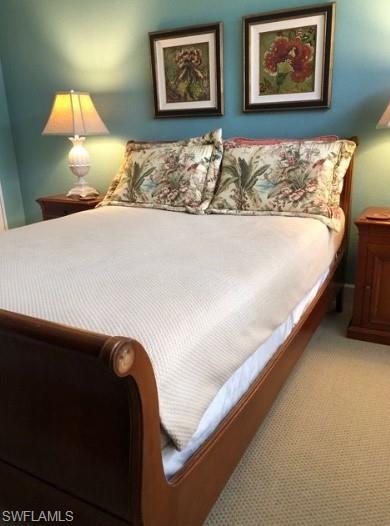 Bedroom with carpet flooring