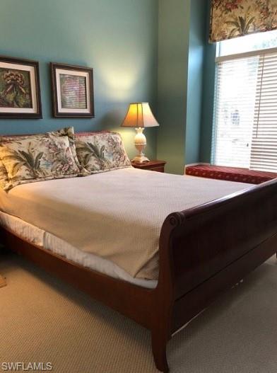 Bedroom featuring carpet
