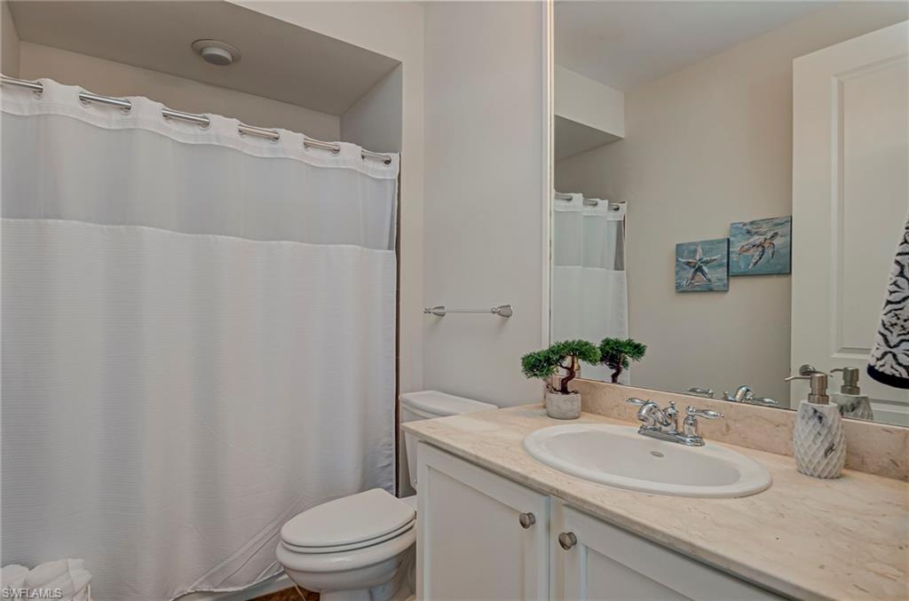 2nd bathroom in the hallway between the other bedrooms- tub/shower combo