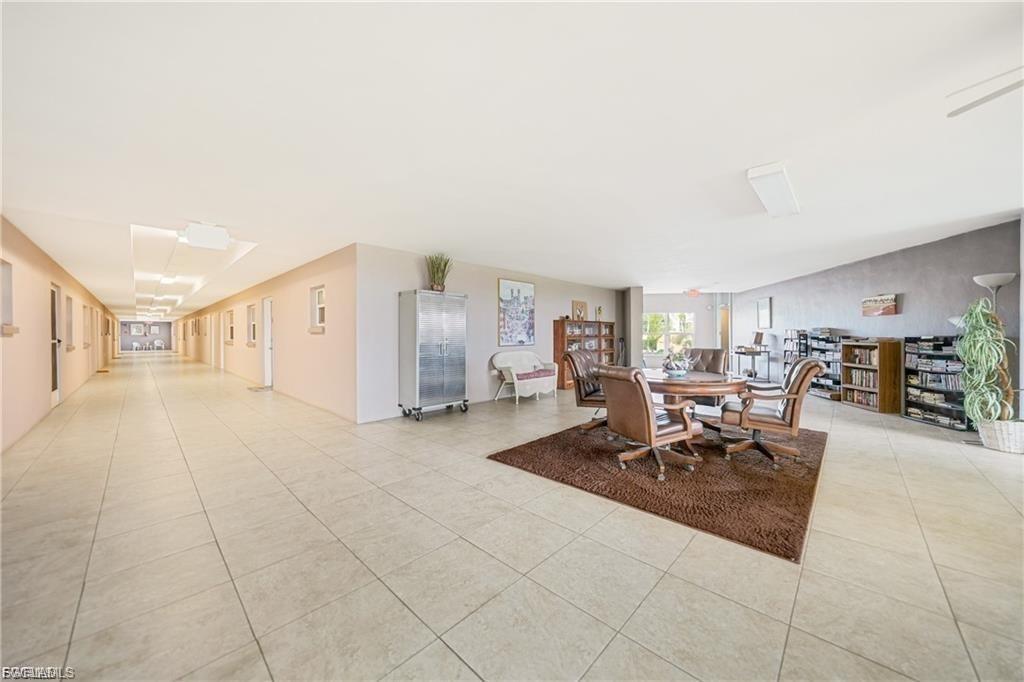 Dining space featuring light tile patterned floors